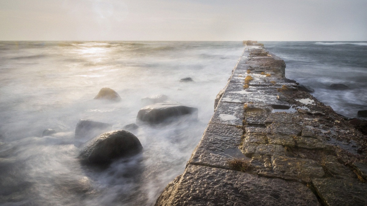 The stone pier at Grönhögen reaching into the Baltic Sea